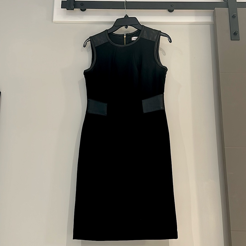 Calvin Klein - black, sleeveless, faux leather trim, gold zipper. Like new.